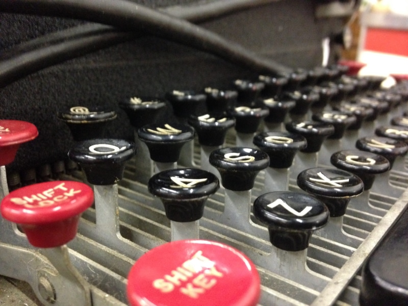 no people, machinery, arts culture and entertainment, red, machine, text, communication, nostalgia, western script, writing, letter, typewriter, push button
