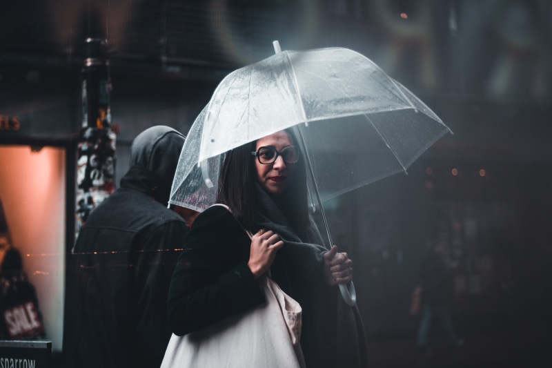 holding, emotion, security, looking, portrait, city, people, bag, hoodie, hood - clothing, 5K, standing, females, waist up, rain, protection, wet, adult