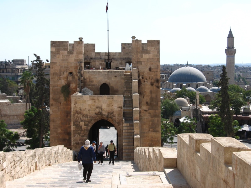 aleppo, day, real people, arch, syria, citadel, entrance, tower, the past, men, history, religion, architecture, incidental people, group of people, built structure