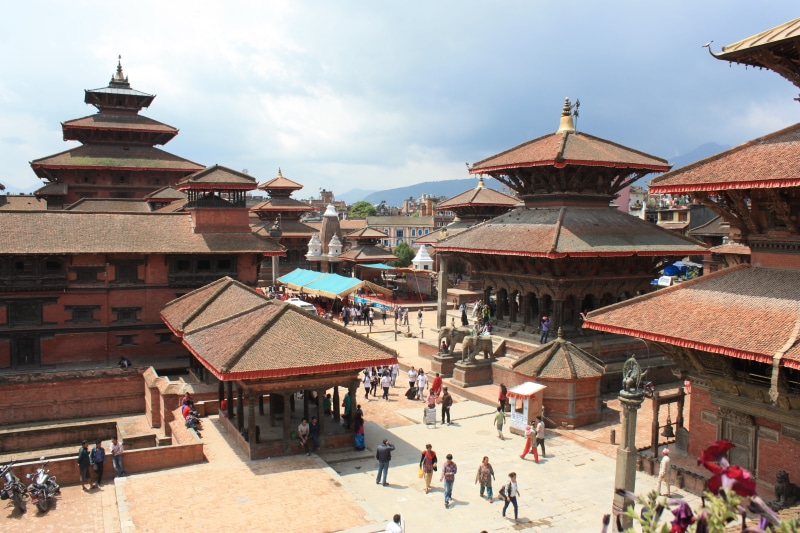 outdoors, built structure, hindu temple, building exterior, real people, kathmandu, travel, tourist, travel destinations, building, religion, belief, group of people