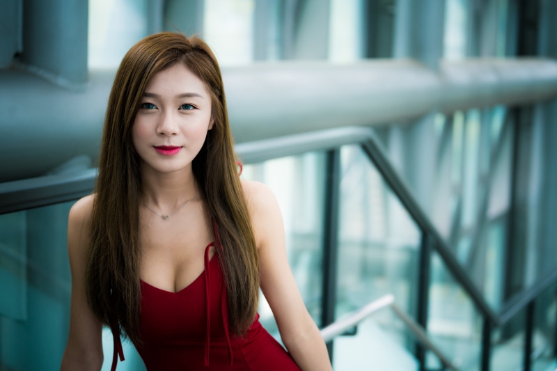 portrait, real people, beauty, young women, railing, brunette, young adult, one person, women, cleavage, looking at camera, casual clothing, brown hair