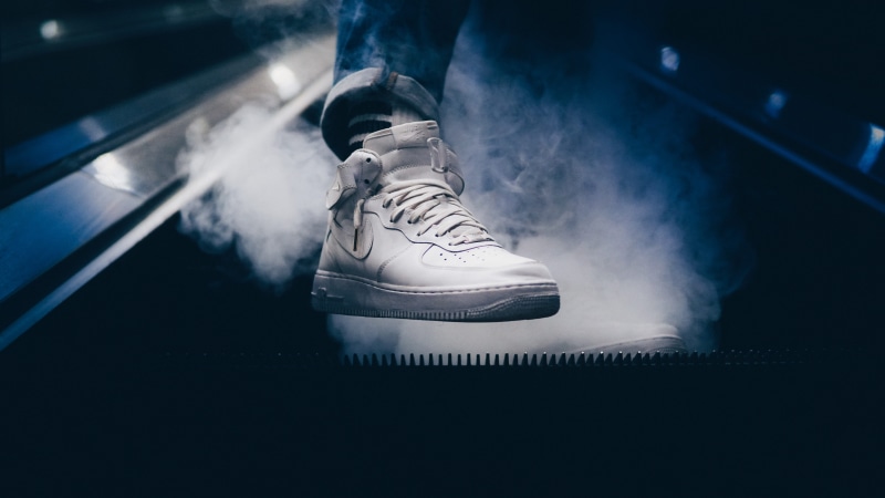 air, body part, sneaker, canvas shoe, white, cold temperature, human leg, mid, low section, shoe, sport, close-up, ice, force, style, baseball - sport