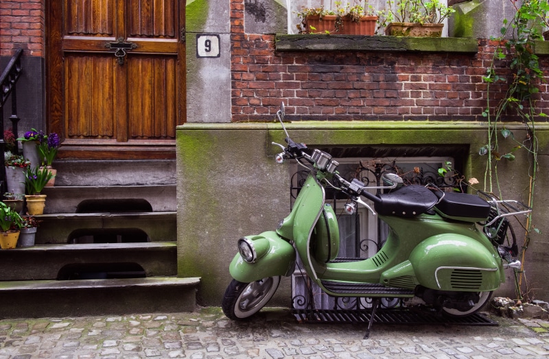 day, vintage, wall - building feature, architecture, green, brick, transportation, scooter, moped, entrance, wall, built structure, land vehicle, garage