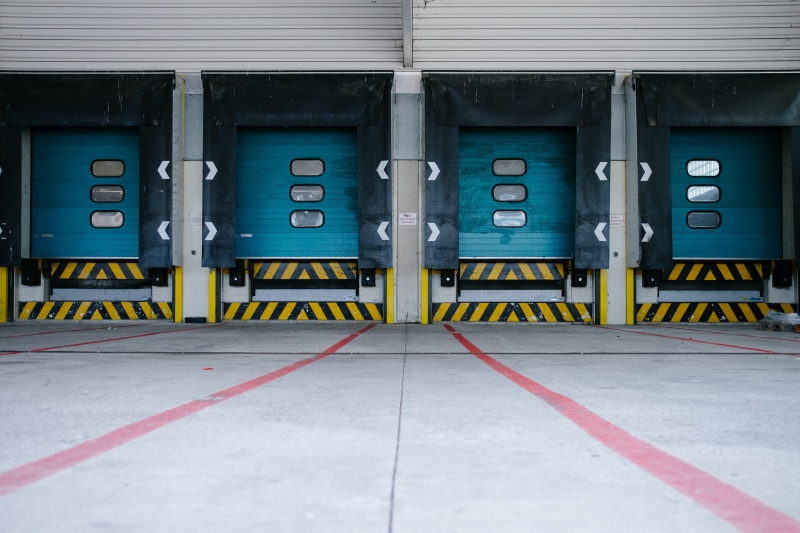 door, industry, parking, architecture, warehouse, transportation, shutter, photo, yellow, four, communication, building, number, safety, freight transportation