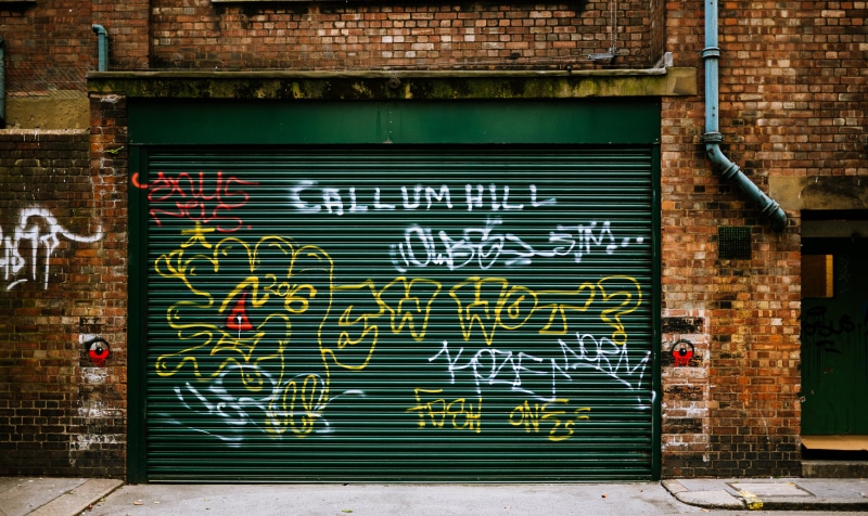 architecture, structure, wood - material, callum, western script, outside, brick, doorway, text, entrance, door, communication, outdoors, sign, built structure