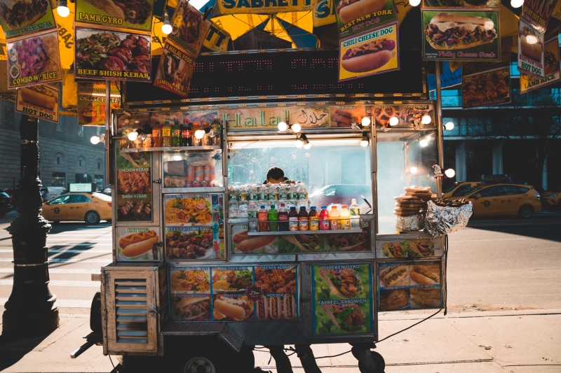 behind, market stall, small business, real people, arcade game machine, food and drink, buisness, car, abundance, living, smokey, cart, chef, large group of objects