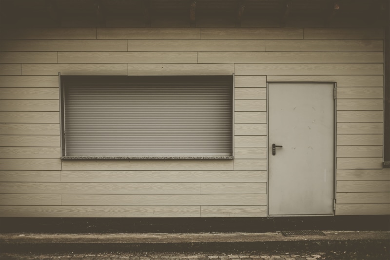 garage, wall, closed, pavement, security, tarmac, no people, entrance, sidewalk, sphere, city, residential district, cobblestone, wall - building feature