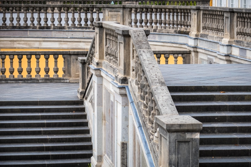 architecture, castle park, day, built structure, baroque, the past, text, tourism, building exterior, low angle view, emergence, rise, staircase, gradually