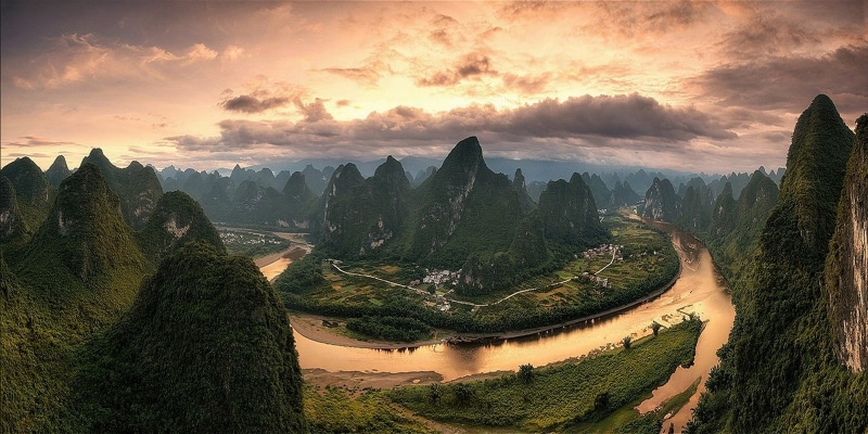 scenics - nature, China, 720P, sunset, clouds, field, nature, travel, tree, cloud - sky, environment, fog, no people, sun, landscape, town, forest, hills