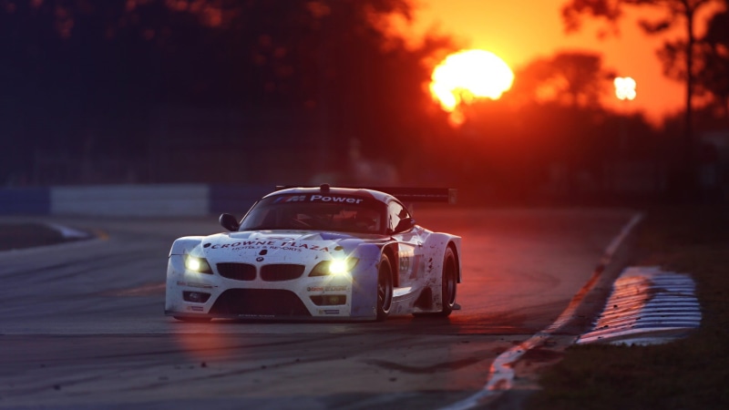 speed, race cars, sunset, mode of transportation, selective focus, motor vehicle, land vehicle, toy car, sunlight, sky, racecar, excitement, sport, road