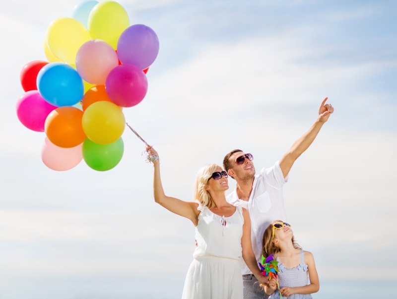 fun, sunlight, lifestyles, balloons, sky, two people, balloon, family, adult, enjoyment, day, sea, sunglasses, celebration, smiling, outdoors, beach, cute