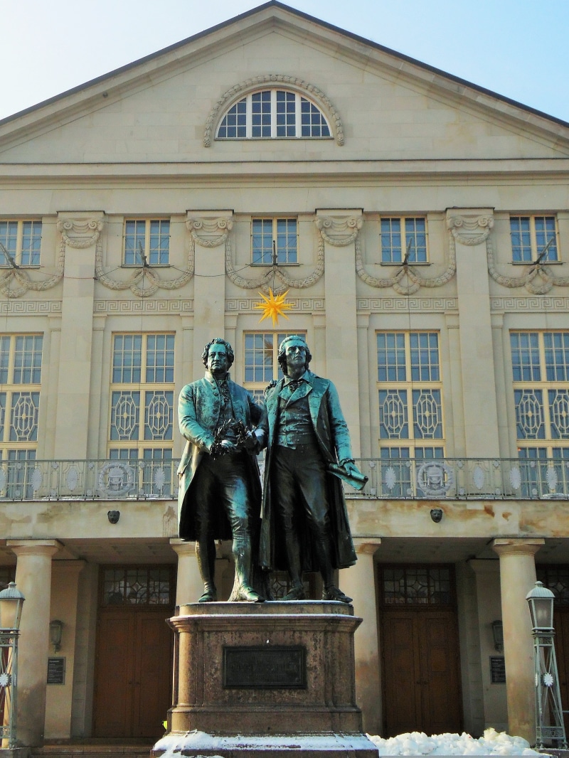 schiller, built structure, male likeness, window, human representation, statue, day, architecture, figure, travel destinations, low angle view, goethe