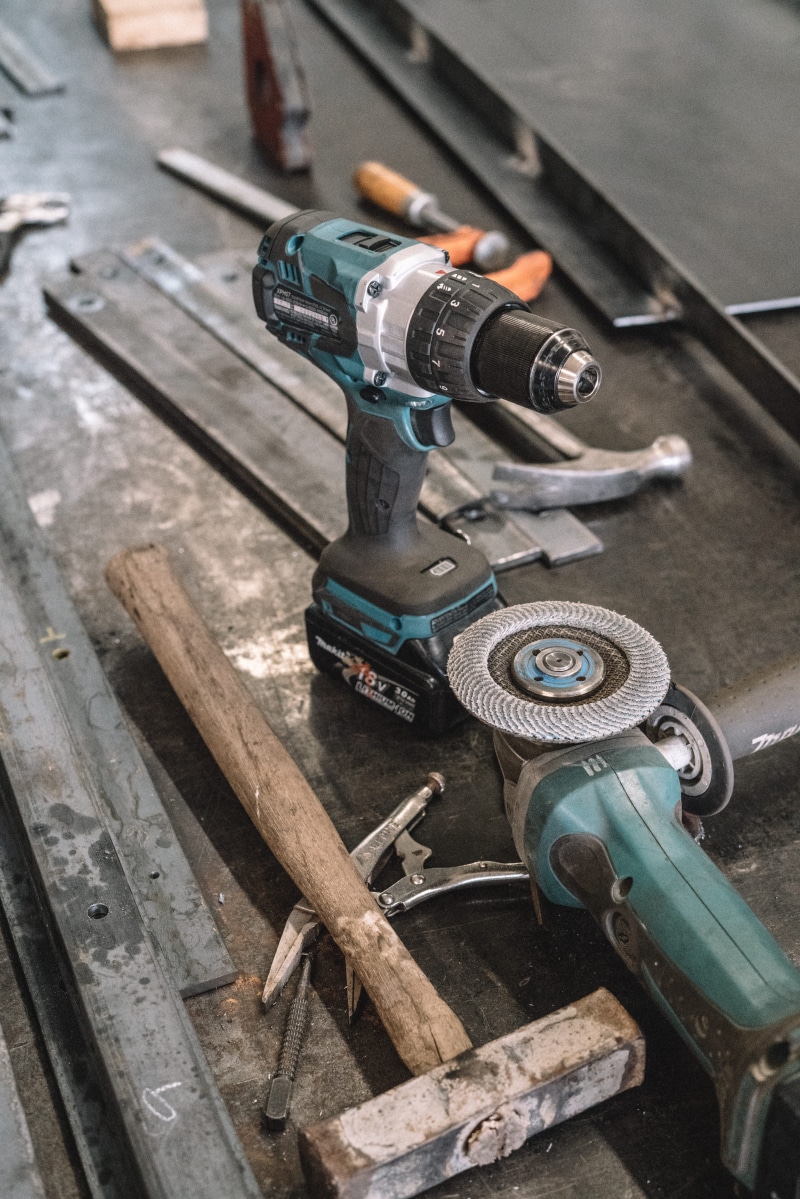 near, high angle view, cordless, sander, metal industry, tool, hardware, manufacturing equipment, still life, equipment, surface, industry, machine part