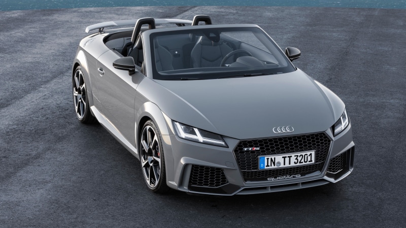 chrome, transportation, high angle view, land vehicle, motor vehicle, racecar, city, Quattro, outdoors, silver colored, mode of transportation, day, road