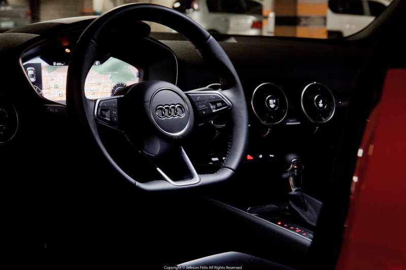 transportation, motor vehicle, indoors, equipment, control panel, gearshift, vehicle interior, land vehicle, focus on foreground, steering wheel, number
