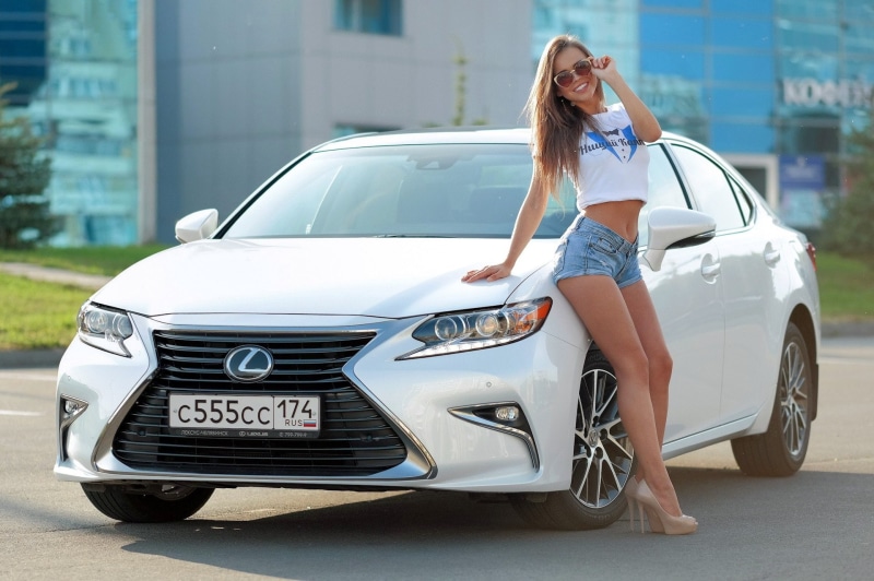 transportation, young women, smiling, lifestyles, adult, T-shirt, belly, high heels, casual clothing, architecture, land vehicle, young adult, sunglasses