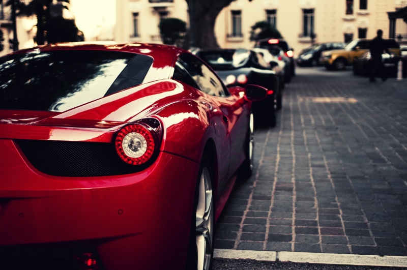 red, city Life, paving stone, building exterior, built structure, motor vehicle, europe, focus on foreground, urban Scene, modern, 1080P, bugatti, sports Car