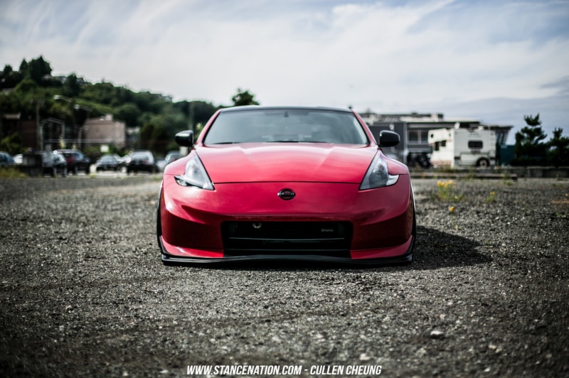 day, transportation, no people, road, car, city, sports car, sky, land vehicle, red cars, mode of transportation, Stance, focus on foreground, Nissan, vehicle