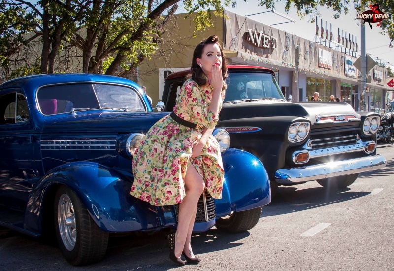 motor vehicle, lifestyles, beautiful woman, transportation, floral, casual clothing, day, model, car, pinup models, blue cars, hairstyle, stationary, street