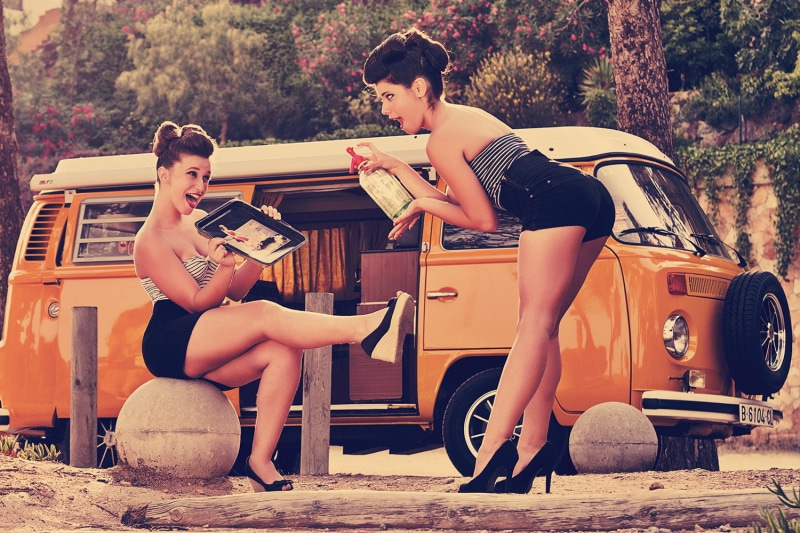 jean shorts, people, two people, mode of transportation, combi, full length, real people, day, outdoors, land vehicle, togetherness, sitting, sunlight