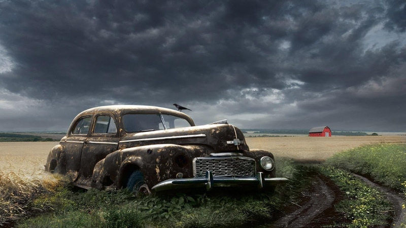 clouds, land, overcast, classic car, outdoors, old car, 1080P, no people, environment, vintage, grass, sky, mode of transportation, dramatic sky, plant