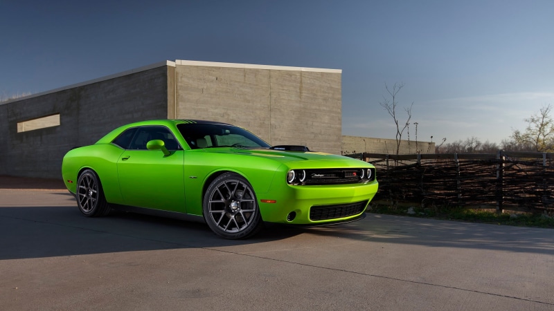 sports car, built structure, green cars, architecture, transportation, motion, green color, motor vehicle, no people, mode of transportation, Dodge Challenger Hellcat