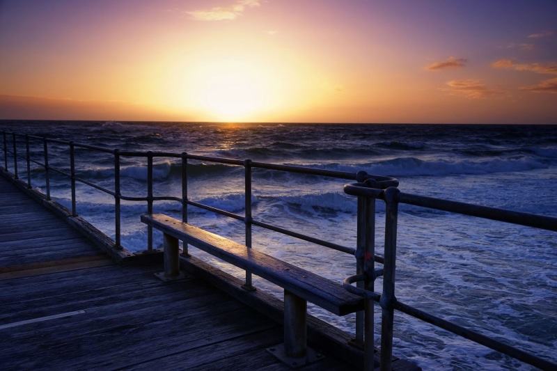 bunk, wood - material, scenics - nature, dark, black, nature, tranquil scene, railing, pier, bed, orange color, no people, sun, beauty in nature, sunset