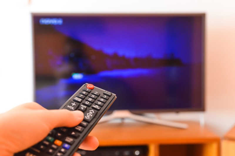 pushing, remote, television show, human hand, changing channels, movies, lifestyles, hand, television set, flat screen, technology, arts culture and entertainment