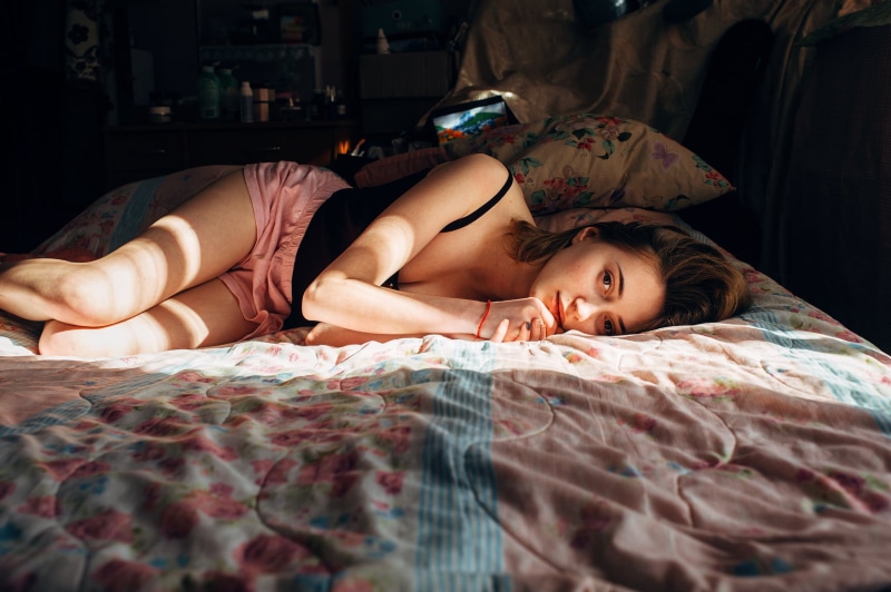 sleeping, one person, sheet, portrait, linen, looking at camera, lying down, bedroom, 720P, relaxation, women, beautiful woman, cleavage, in bed, real people