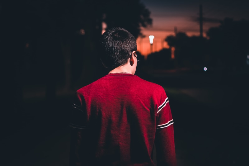 long sleeve, leisure activity, person, banister, lifestyles, light, man, portrait, focus on foreground, adult, night, sleeve, illuminated, time, outdoors