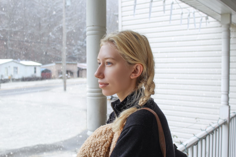 model, standing, real people, contemplation, warm clothing, one person, blueeyes, outdoors, blond hair, sweedan, portrait, architecture, winter, day, girl