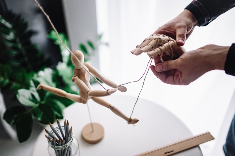 wood, indoors, lifestyles, table, doll, men, cleaning, yarn, nature, finger, various, adult, caucasian Ethnicity, people, two people, hand, gesture, pencils