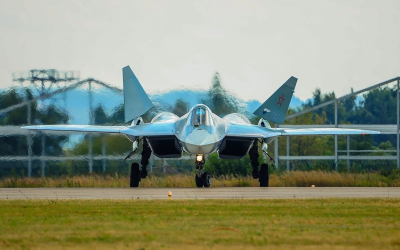 outdoors, Sukhoi PAK FA, plane, airport runway, transportation, airport, fighter plane, army, sky, mode of transportation, day, airplane, tree, nature