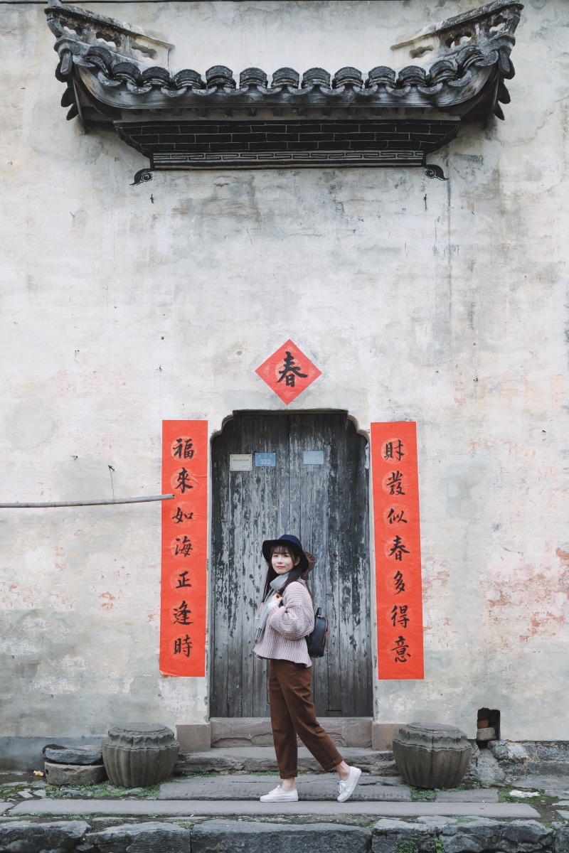 backpack, one person, text, 5K, street wear, front, front view, building, day, wall - building feature, wooden door, architectural, young adult, people