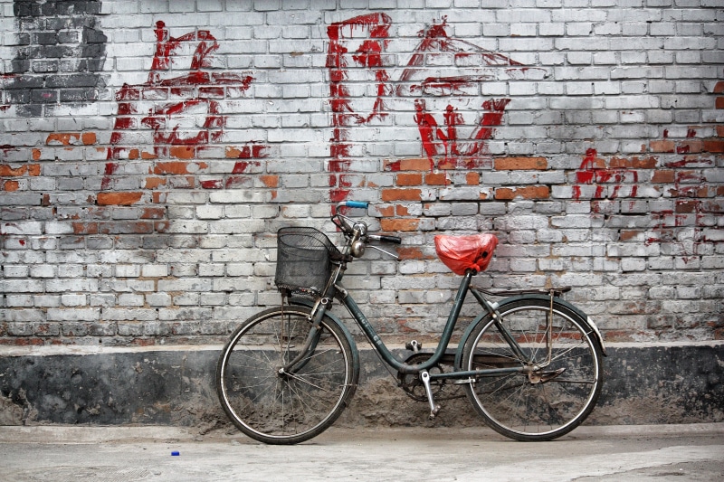 stationary, beijing, land vehicle, chinese writing, transportation, red, 4K, building exterior, brick, no people, mode of transportation, outdoors, city