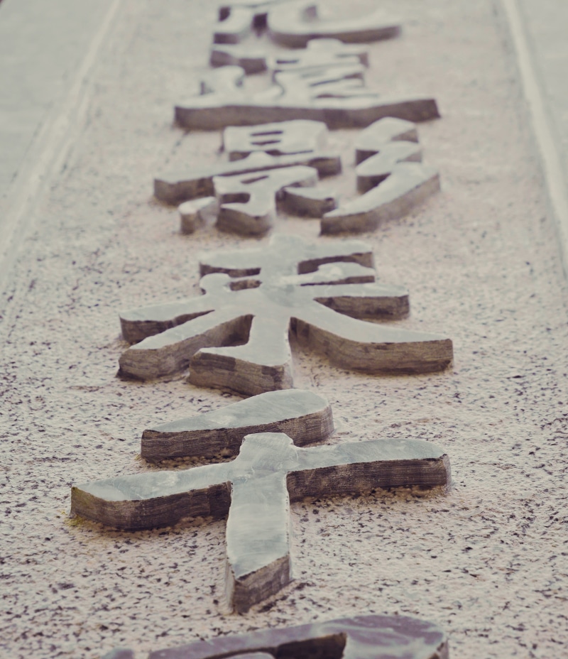 script, high angle view, sun world, chinese, stone, large group of objects, asian stone, vietnam, table, chinese script, close-up, text, asian culture