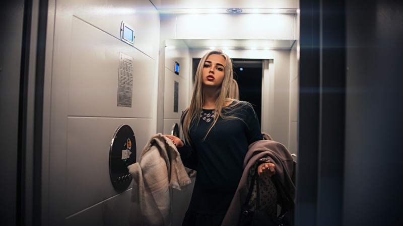 model, women indoors, long hair, women, blonde, elevator, black dress, 2K
