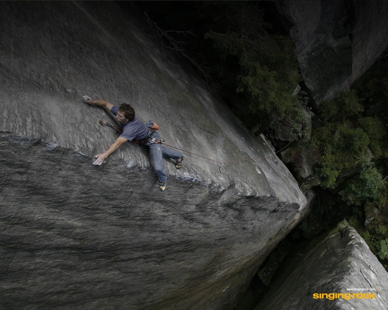 activity, real people, outdoors, one person, extreme sports, rock - object, full length, water, sport, leisure activity, rock climbing, mountain, climbing