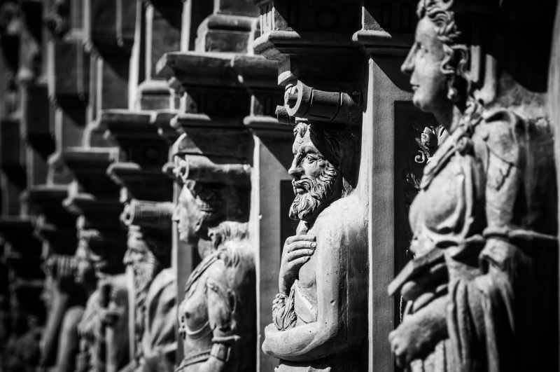 historic, historical, in a row, selective focus, figures, grayscale, no people, built structure, belief, craft, place of worship, architecture, statues