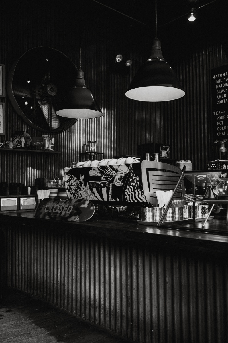 lighting equipment, cafe, food and drink, meal, dish, shelf, pub, lamp, business, couch, light, restaurant, no people, light fixture, indoors, cafeteria