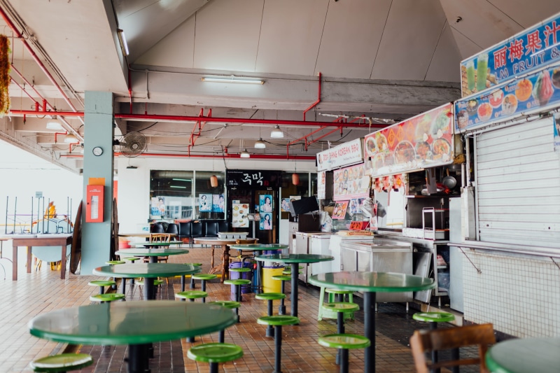 ceiling, building, store, urban, green, pedestal, retail, food court, wooden, meal, business, built structure, soda, drink, large group of objects, choice