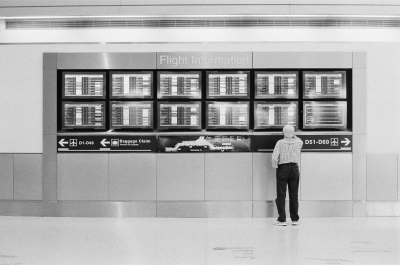 information, floor, built structure, human, one person, grey, lifestyles, postal office, western script, men, airport, technology, kiosk, clothing, person