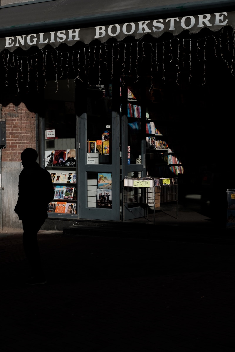 shop, signage, newsstand, person, built structure, real people, curtain, 5K, kiosk, architecture, bookstore, lifestyles, large group of objects, pub, standing