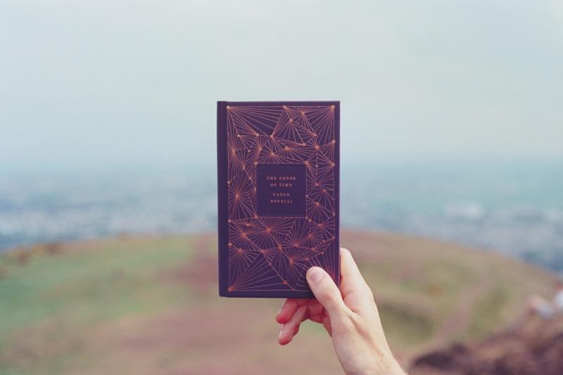 universe, leisure activity, photography, picture frame, day, landscape, dreamy, outdoors, copy space, human hand, human body part, nature, book, close-up