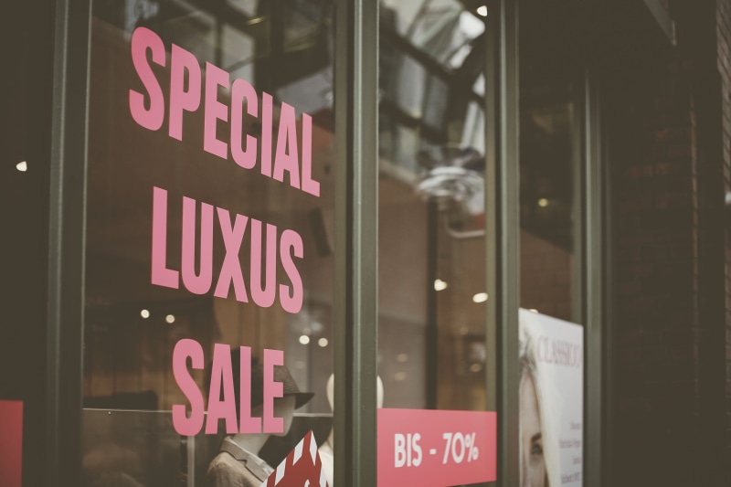 apparel, information sign, information, built structure, capital letter, luxus, illuminated, cafeteria, text, flag, door, building exterior, store window