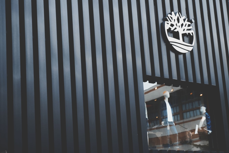 wall - building feature, pattern, window, communication, city, stripes, mannequins, security, glass items, clothes, technology, design, logo, daytime, display window