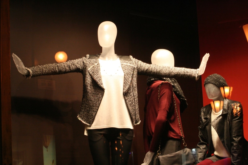 illuminated, display, standing, wearing, boutique, fashion, representation, shop, costume, human representation, blazer, clothing store, clothing, showcase