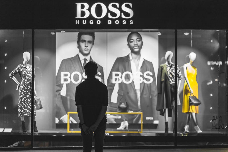 coat, boss, apparel, poster, young adult, champs-élysées, representation, indoors, clothing, male likeness, 5K, men, lighting, billboard, males, human