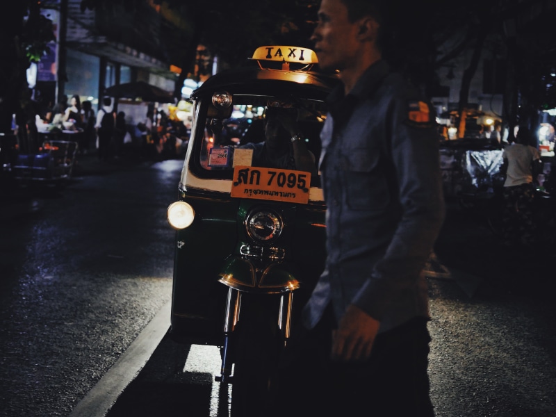 travel, public transportation, vehicle, night, men, store, road, transportation, sidewalk, architecture, auto, real people, group of people, built structure