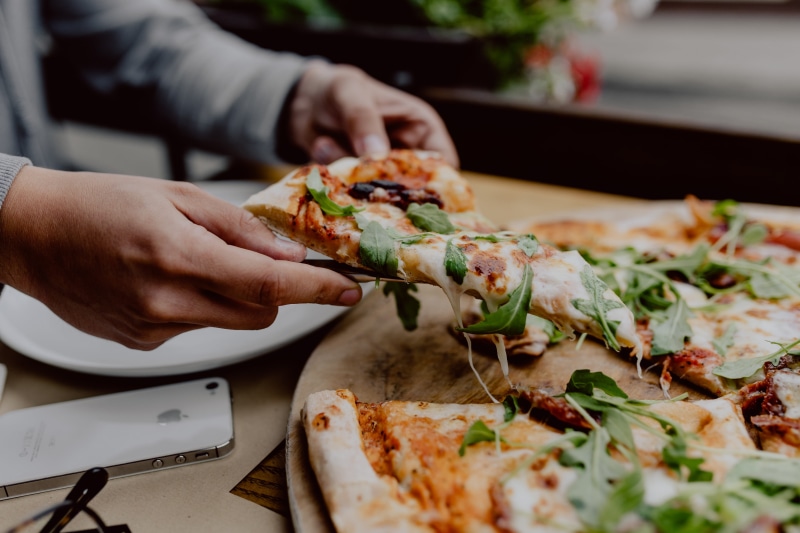 delicious, adult, italian, pizza, human body part, cozy, italian food, hungry, human hand, herb, dinner, meal, hand, food and drink, eating, cheese, temptation